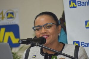 Claudine Allen (right), Member Ombudsman, The Jamaica National Group, gives an overview of the JN Circle.
